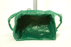 Dog waste bags in use showing long handles and large capacity